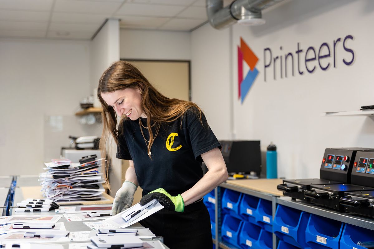 Preparing sublimation film transfers for fully printed cases at Printeers