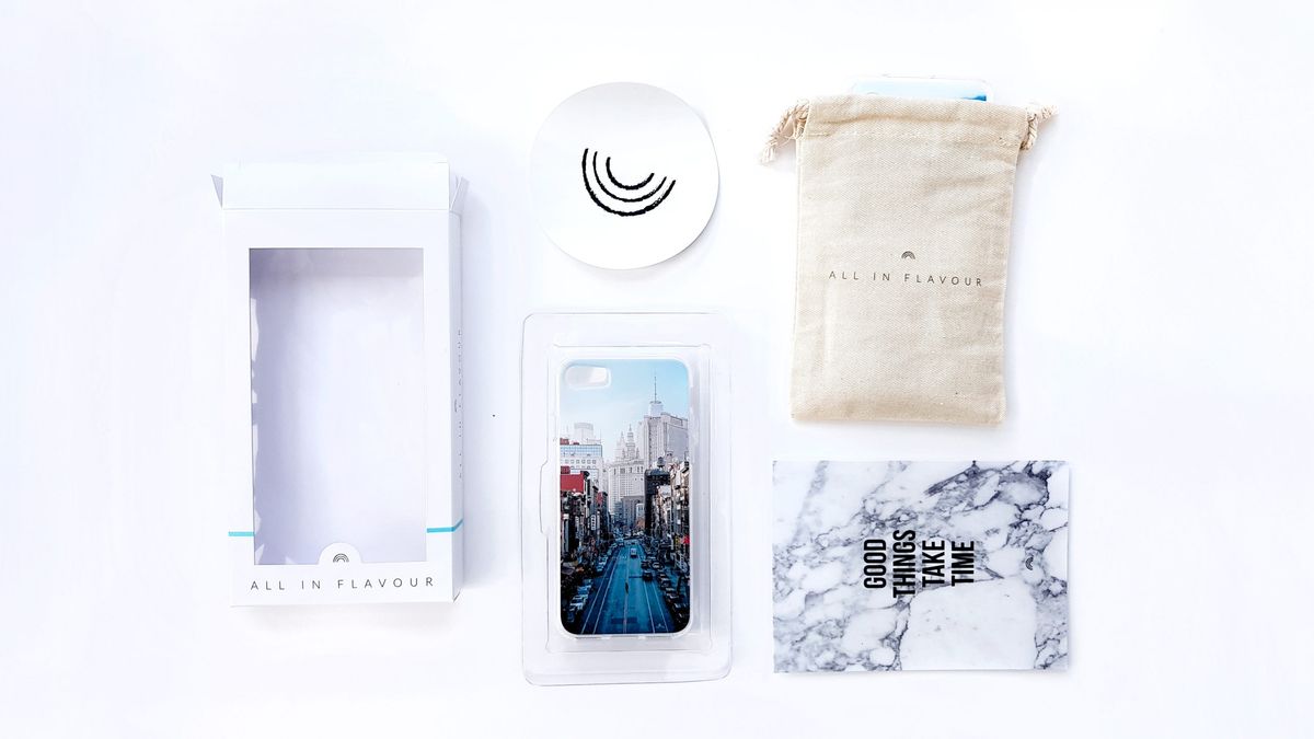 Custom-branded packaging and inserts laid out flat
