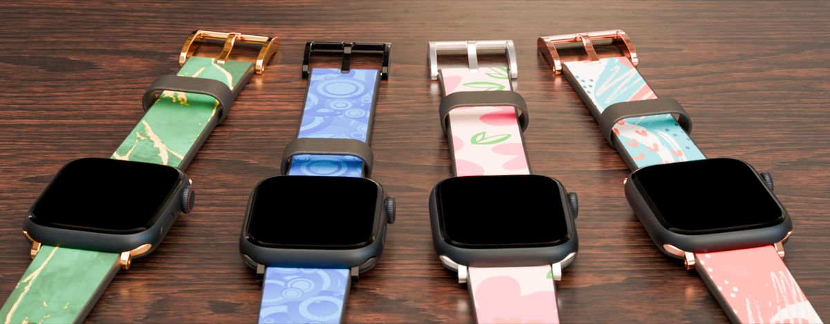 Four printed Apple Watch bands, each with a different clasp and connector finish