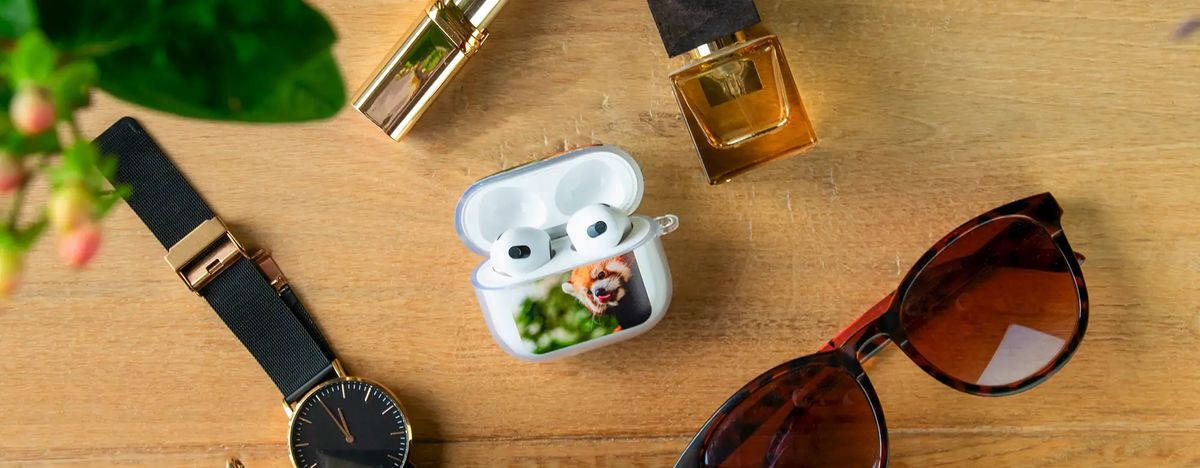 A custom front printed soft AirPods case in everyday use