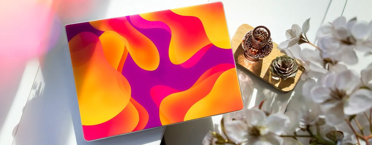 A custom MacBook case in everyday use