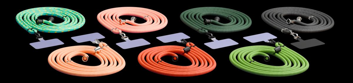 Universal phone cords in all available colors: Mint green and yellow, Pink, Forest green, Black, Dusty pink, Pumpkin orange, and Sage green